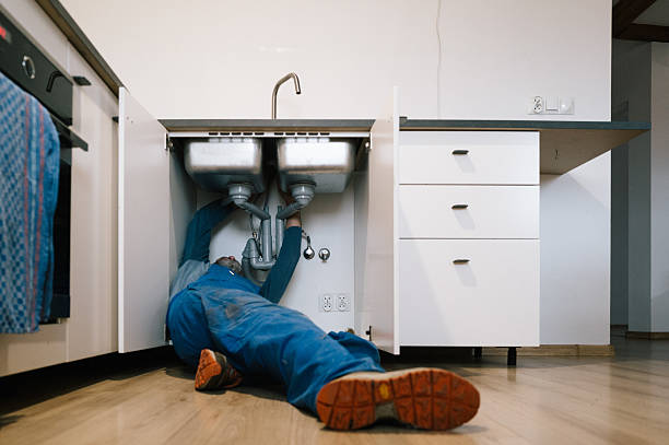 Professional Plumbing technician working in Malone, FL